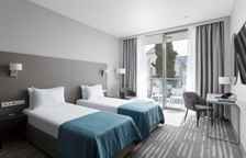 Улучшенный Стандарт с 2 раздельными или 1 кроватью