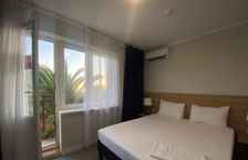 Двухместный Стандарт с балконом с одной кроватью + доп.место 0-12 (Коттедж)