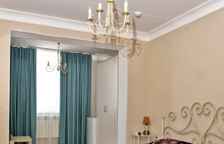 Делюкс с одной двуспальной кроватью