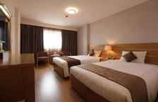 Трёхместный номер Deluxe