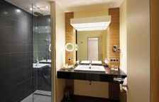 Четырёхместный номер Comfort с балконом и с видом на сад