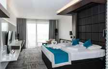 Трёхместный номер Deluxe с балконом