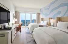 Четырёхместный номер Deluxe с балконом и с видом на океан