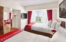 Четырёхместный полулюкс с частичным видом на океан