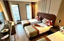 Трёхместный номер Deluxe