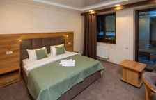 Трёхместный номер Deluxe с балконом