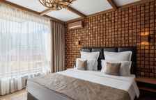 Двухместный полулюкс с балконом и с видом на горы