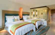 Четырёхместный номер с балконом и с видом на сад