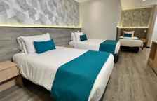 Трёхместный номер Deluxe